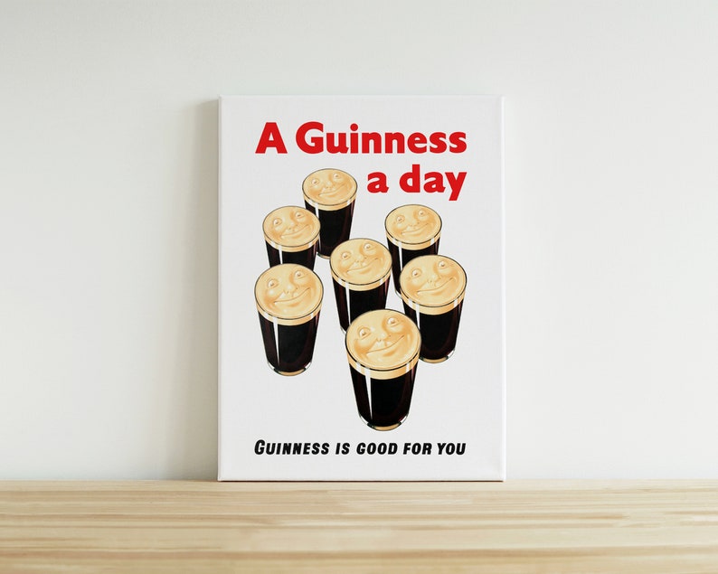 May include: A vintage Guinness advertisement featuring the slogan "A Guinness a day" and the tagline "Guinness is good for you". The ad depicts six glasses of Guinness with smiling faces.