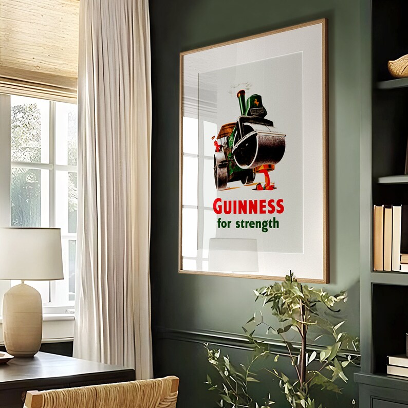 May include: A vintage Guinness poster featuring a cartoon steamroller wearing a green hat and the text "GUINNESS for strength".