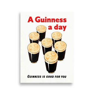 May include: A vintage Guinness advertisement featuring the slogan "A Guinness a day" and the tagline "Guinness is good for you". The ad depicts eight glasses of Guinness with smiling faces.