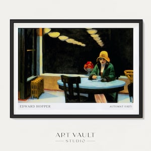 May include: A painting by Edward Hopper titled "Automat (1927)" depicts a woman in a yellow hat sitting alone at a table in a dimly lit diner. The woman is wearing a green coat and holding a cup. The diner has a blue table, black chairs, and a radiator in the background.