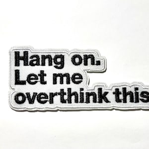 May include: A set of three ceramic mugs with a speckled, matte finish. Each mug features a different color: light blue, cream, and gray. The mugs have a simple, modern design, perfect for coffee or tea.