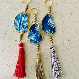 Oyster shell keychain / Dark blue coral design decoupaged oyster shell keychain with tassels