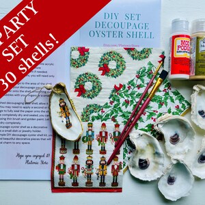 May include: DIY oyster shell decoupage kit with 30 shells, Mod Podge, paint, brushes, and decorative paper with Christmas wreath and nutcracker designs. Includes text "DIY PARTY SET 30 shells!"