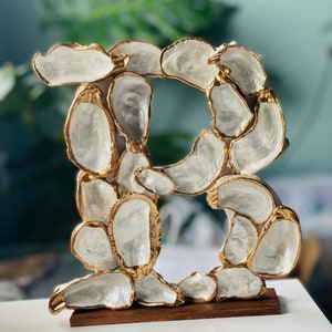 Hand painted pearl and gold Oyster Shells Home Monogram on a wooden base