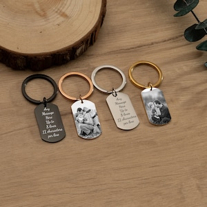 May include: Four keychains with different colored metal rings and rectangular tags. Each tag has a black and white photo of a father and son. The text on the tags reads "Any Message Here Up to 8 lines 12 characters per line".