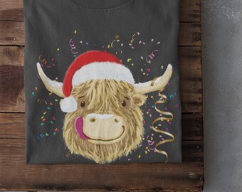 ハイランドカウのクリスマスTシャツ、ユニセックスのスコットランドの冬Tシャツ