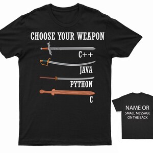 May include: Black t-shirt with the text "CHOOSE YOUR WEAPON" and four swords with the text "C++", "JAVA", "PYTHON", and "C" below each sword.