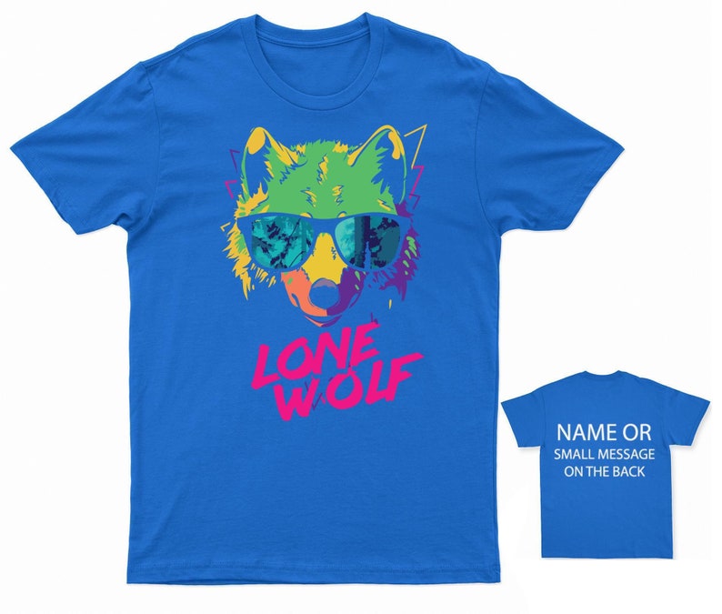 May include: A blue t-shirt with a colorful graphic of a wolf wearing sunglasses and the text "LONE WOLF" in pink and green letters.