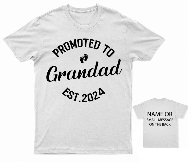 May include: White t-shirt with black text that reads "Promoted to Grandad Est. 2024" with a pair of baby footprints above the word "Grandad".