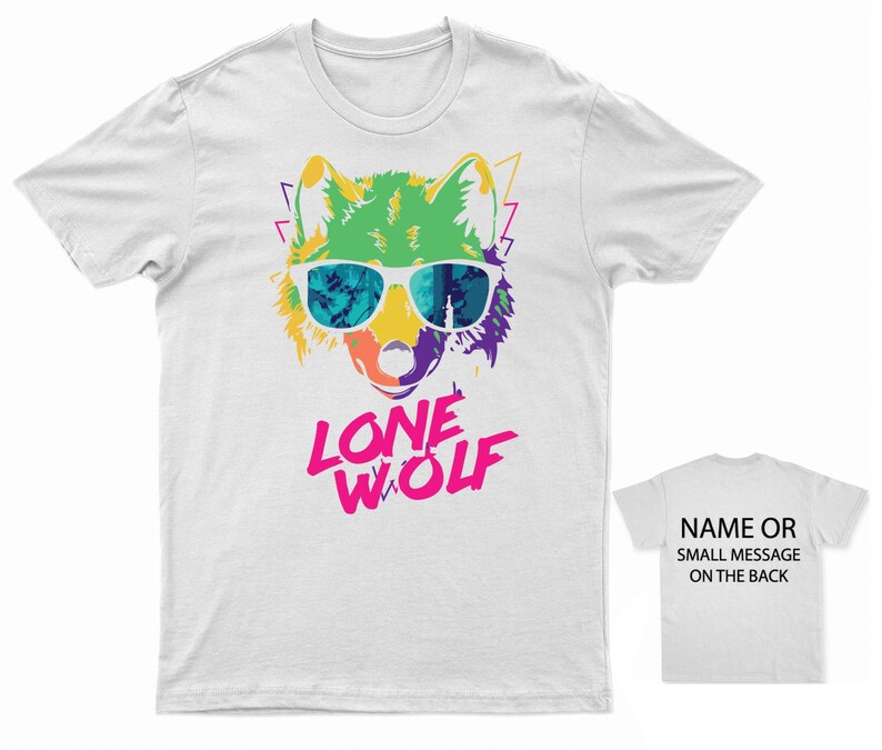 May include: White t-shirt with a colorful graphic of a wolf wearing sunglasses and the text "LONE WOLF" in pink letters.