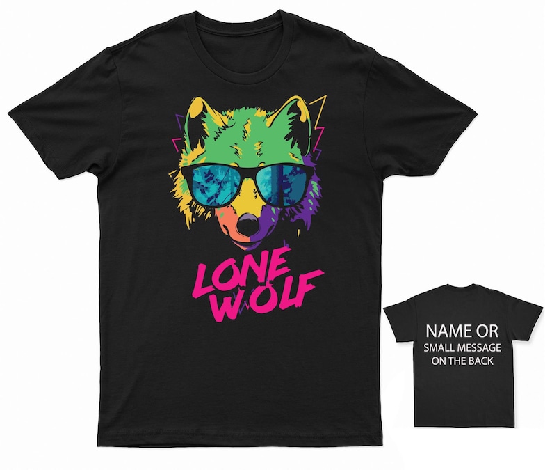 May include: Black t-shirt with a colorful graphic of a wolf wearing sunglasses and the text "LONE WOLF" in pink and white.