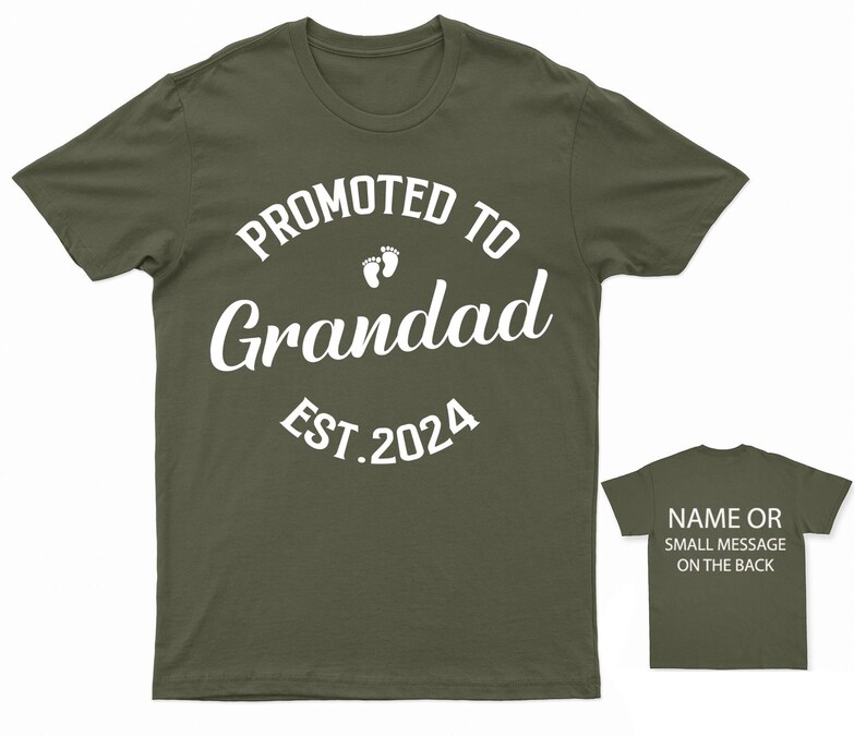 May include: Olive green t-shirt with white text that reads "Promoted to Grandad Est. 2024" with two small footprints above the word "Grandad".