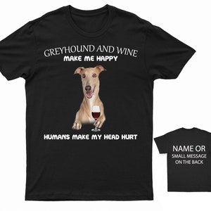 May include: Black t-shirt featuring a greyhound dog holding a glass of wine. The text on the shirt reads "Greyhound and wine make me happy. Humans make my head hurt."