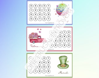 May include: Three printable cards with a monthly theme. Each card has a colorful illustration and a grid of circles with numbers. The first card is for January and features a disco ball. The second card is for February and features a red truck with flowers. The third card is for March and features a green leprechaun hat. Each card has the text "One Frugal Introvert" at the bottom.