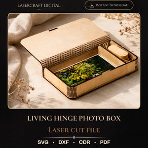 May include: A light-coloured wooden photo box featuring a living hinge lid, a rectangular compartment for photographs, and a smaller side section containing a wooden USB drive. The text LASERCRAFT DIGITAL, LIVING HINGE PHOTO BOX, LASER CUT FILE, SVG, DXF, CDR, PDF is visible.