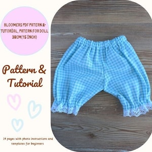 May include: A PDF pattern and tutorial for making doll bloomers. The pattern is for a 15-inch doll and includes 14 pages with photo instructions and templates for beginners. The bloomers are blue and white gingham with white lace trim.