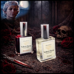 May include: Two square perfume bottles with silver caps. One bottle contains red liquid and the other is clear. Both have labels that read "Velvet Fang". The background includes a skull, roses, and a fantasy character.