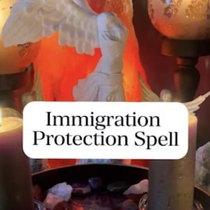 May include: A white angel statue with outstretched wings is centered in front of a glowing orange background. The text "Immigration Protection Spell" is displayed on a white rectangular banner. Candles and crystals surround the statue.