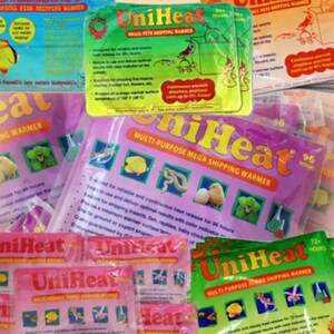 May include: Assortment of UniHeat multi-purpose shipping warmers in various sizes. The warmers are pink, green, and orange with the text "UniHeat" and "Multi-Purpose" printed on them. The warmers are designed to provide continuous heat release for up to 96 hours.