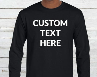 May include: Black long-sleeved t-shirt with white text that reads "CUSTOM TEXT HERE".
