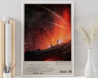 May include: Framed Star Wars: Episode III - Revenge of the Sith movie poster. The artwork depicts a fiery volcanic landscape with two figures engaged in a lightsaber duel. The poster includes the film's title, credits, and the release date, May 19.