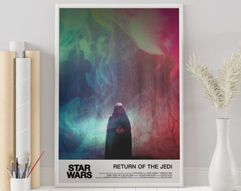 May include: A framed Star Wars movie poster for "Return of the Jedi." The poster features a figure in a dark cloak against a colorful, abstract background of pink, green, and blue hues. The Star Wars logo and movie title are at the bottom.