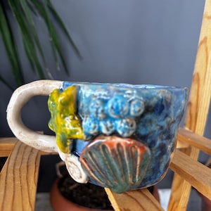 Ocean İnspired Handmade Ceramic Mug with 3D Seashell Design.