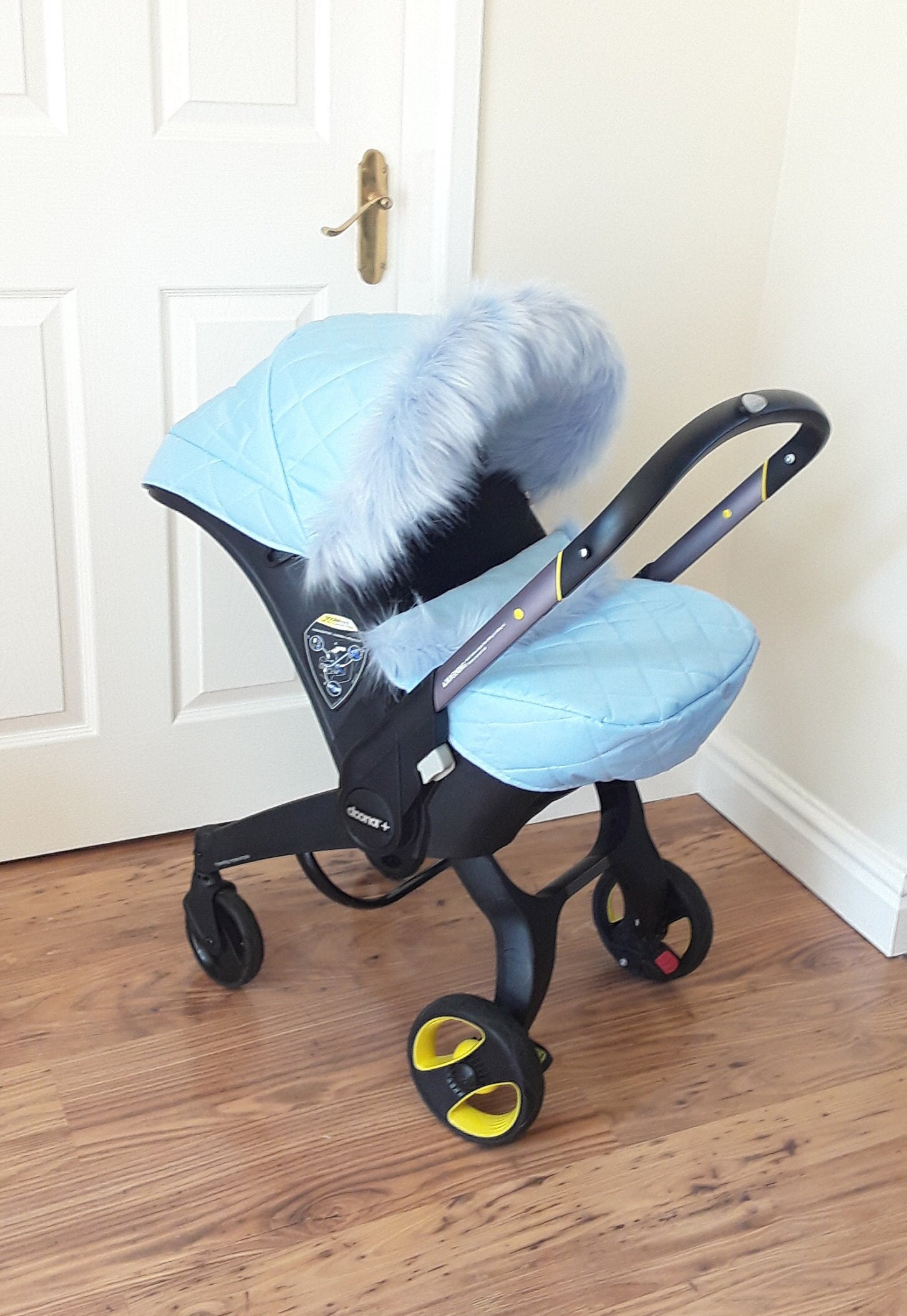 Blue doona car seat top