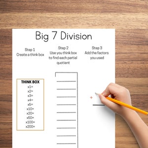 Puede incluir: Una hoja de trabajo con el t&iacute;tulo "Big 7 Division" e instrucciones para crear una caja de pensar, usar la caja de pensar para encontrar cocientes parciales y sumar los factores utilizados. La hoja de trabajo incluye una caja de pensar con m&uacute;ltiplos de 1, 2, 3, 4, 5, 10, 20, 50, 100 y 200, un espacio en blanco para la caja de pensar y un espacio en blanco para sumar los factores.