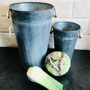 Medium distressed metal vase