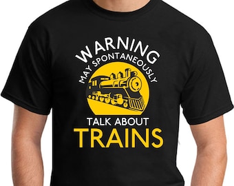 May include: Black t-shirt with a yellow circle and a cartoon train. The text "WARNING MAY SPONTANEOUSLY TALK ABOUT TRAINS" is printed on the shirt.