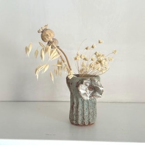 A ceramic flower/bud vase, handmade textured with flower, stoneware pottery