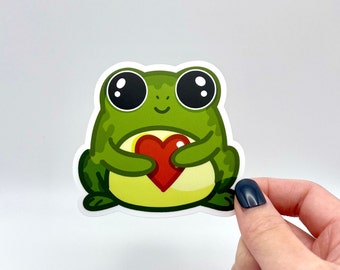 Sticker en vinyle mat Saint-Valentin grenouille avec coeur