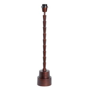 May include: A tall, copper-colored floor lamp with a stacked, tiered design. The lamp has a simple, round base and a standard light bulb socket.