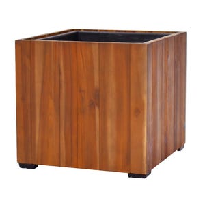 Può includere: Una fioriera quadrata in legno con finitura in legno naturale. La fioriera è costruita con assi di legno verticali e ha un interno scuro. Poggia su quattro piedini neri.