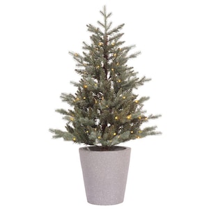 May include: A potted artificial Christmas tree with white lights. The tree is in a gray pot and has a realistic look.