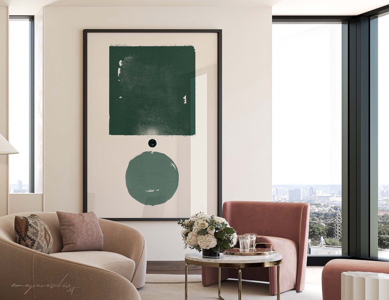 Peut inclure: Une impression d'art abstrait moderne avec un carr&eacute; et un cercle verts sur un fond blanc. L'impression est encadr&eacute;e en noir et accroch&eacute;e &agrave; un mur blanc dans un salon.
