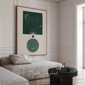 Peut inclure: Impression num&eacute;rique d'art abstrait avec un carr&eacute; et un cercle verts sur un fond beige. L'impression est encadr&eacute;e et accroch&eacute;e &agrave; un mur blanc dans un salon moderne.