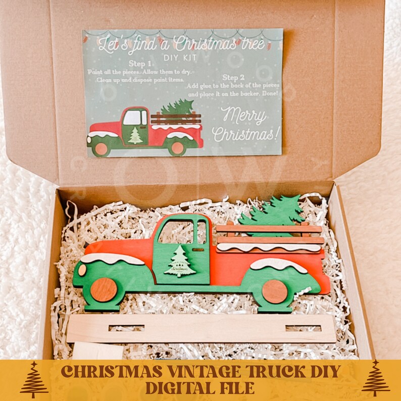 May include: A red and green vintage truck with a Christmas tree in the back. The truck is made of wood and is ready to be painted. The image includes instructions for painting the truck and assembling it. The text on the image reads "Let's find a Christmas tree DIY KIT".