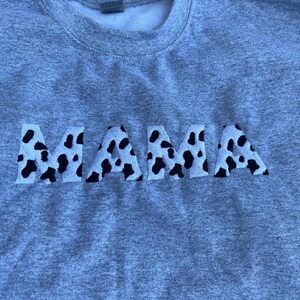 Cow print “Mama” embroidered sweatshirt