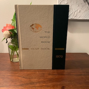 Vintage The World Book Encyclopedia Year Book 1970, Reviewing the events of 1969.