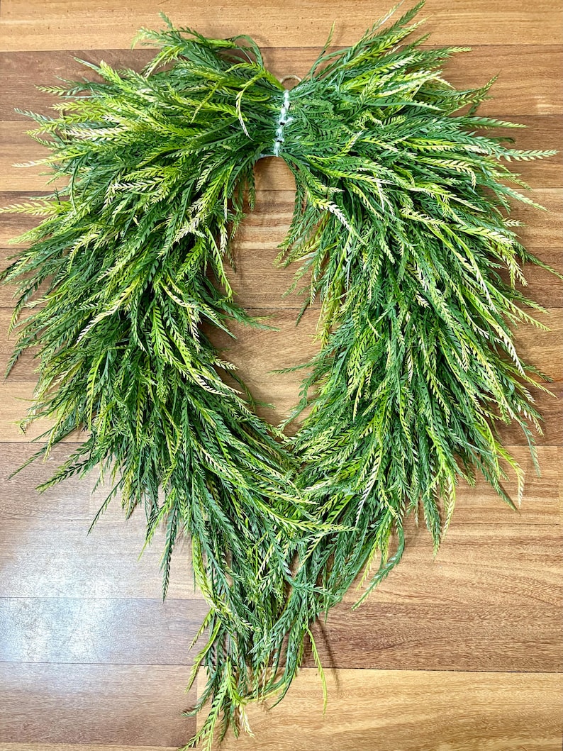 Flowing real-feel faux saw grass with natural movement and texture