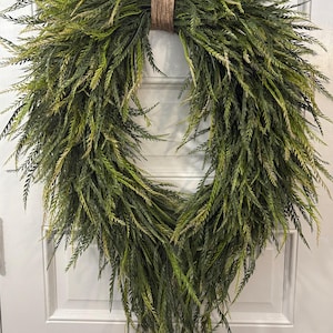 Flowing real-feel faux saw grass with natural movement and texture