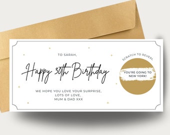 May include: A white card with gold accents and a gold circle with a scratch-off area. The card says "Happy 30th Birthday" and "To Sarah". The scratch-off area says "You're going to New York!" and "Scratch to Reveal".