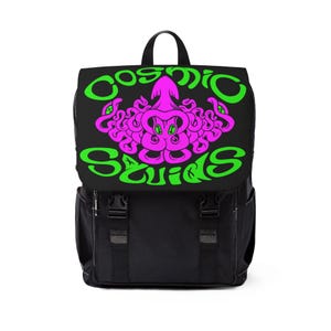May include: Black backpack with a flap featuring a neon green and pink graphic of an octopus and the words "Cosmic Squids." The backpack has two front pockets with black buckles and a top handle.
