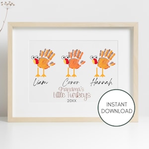 May include: A framed print featuring three handprint turkeys in orange, brown, and yellow with googly eyes and red wattles. Below each turkey are the names Liam, Conor, and Hannah. The text reads Grandma's Little Turkeys 20XX with an Instant Download badge.