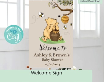 May include: A Winnie the Pooh themed welcome sign for a baby shower. The sign features a cartoon Winnie the Pooh holding a honey pot, with bees flying around him. The text on the sign reads "Welcome to Ashley & Brown's Baby Shower 07/24/2024".