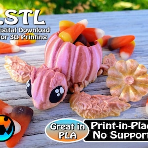 May include: A 3D printed pink pumpkin shaped candy dish with a gold flower and leaves. The dish is filled with candy corn. The text "STL Digital Download for 3D Printing" is at the top of the image. The text "Great in PLA Print-in-Place No Supports" is at the bottom of the image.