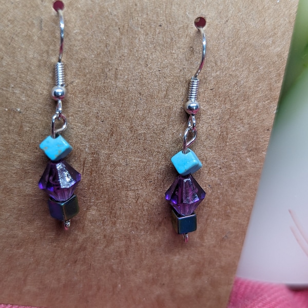 Hematite, crystal, and turquoise colored magnetite dangle earrings
