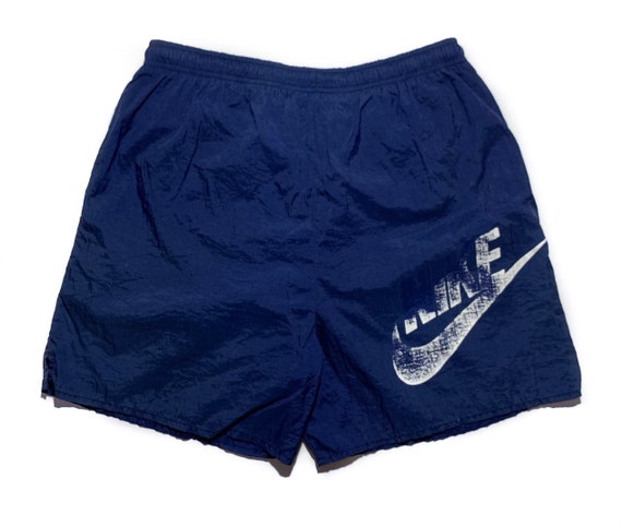 Pantalon nike logo grande hotsell